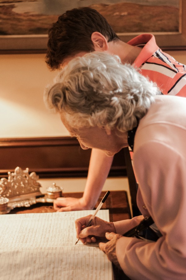 Signing the guest register